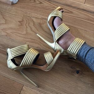 Gold High Heel shoe